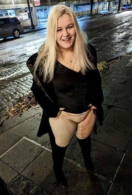 Bottomless chubby blonde flashing her shaved pussy